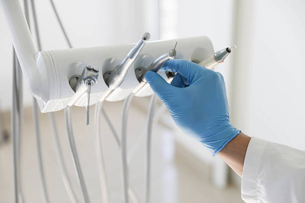 Professional Tooth Extraction technician working in Grayson, CA
